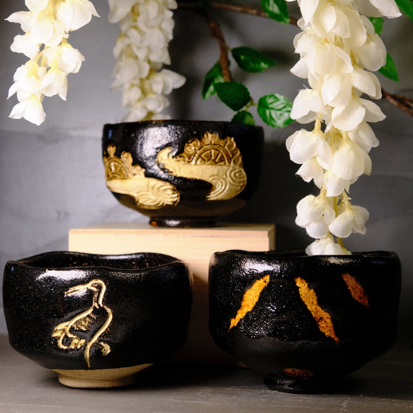 Golden Currents - Black raku Matcha bowl by Sasaki Matsuraku